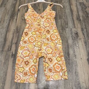 FP Movement by Free People Floral Jumpsuit in Yellow and Orange
